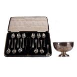 A SET OF TWELVE GEORGE V SILVER TEASPOONS AND A PAIR OF SUGAR TONGS