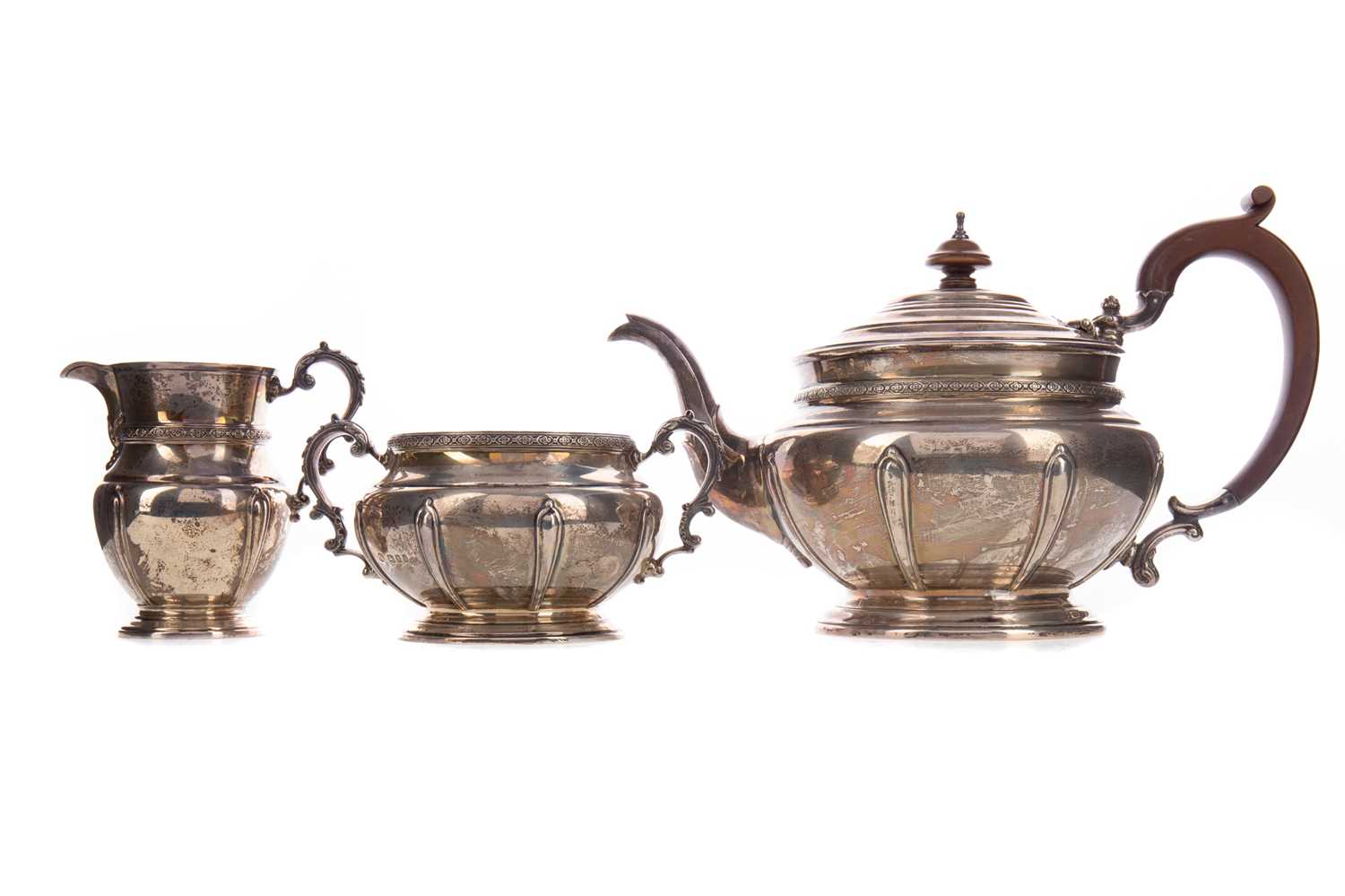 A GEORGE V SILVER THREE PIECE TEA SERVICE