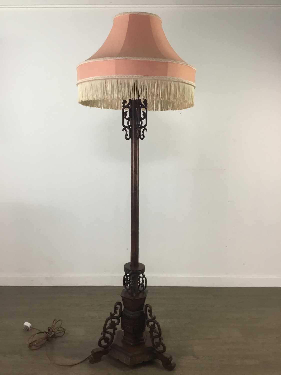 A CHINESE HARDWOOD STANDARD LAMP