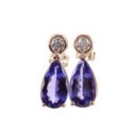 A PAIR OF TANZANITE AND DIAMOND EARRINGS