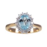 AN AQUAMARINE AND DIAMOND RING