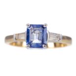 A SAPPHIRE AND DIAMOND RING