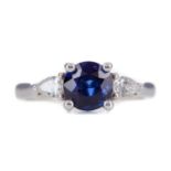 A SAPPHIRE AND DIAMOND RING