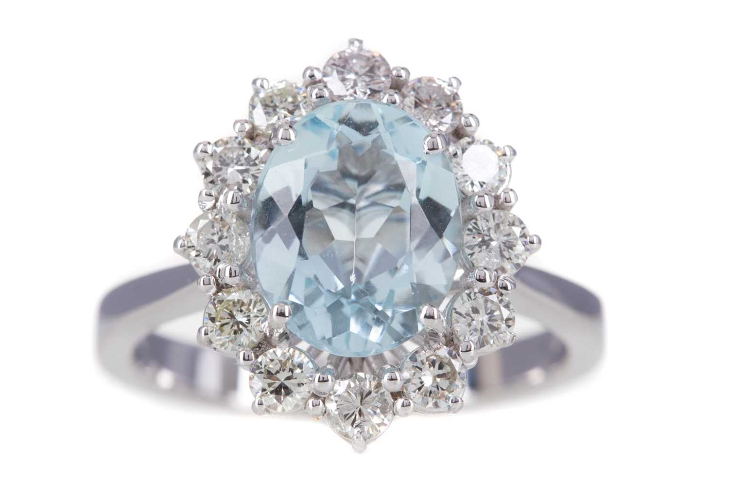 AN AQUAMARINE AND DIAMOND RING