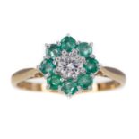 AN EMERALD AND DIAMOND RING