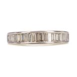 A WHITE GOLD DIAMOND HALF ETERNITY RING