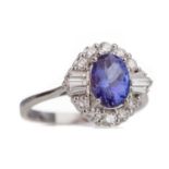 A TANZANITE AND DIAMOND RING