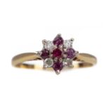 A RUBY AND DIAMOND CLUSTER RING