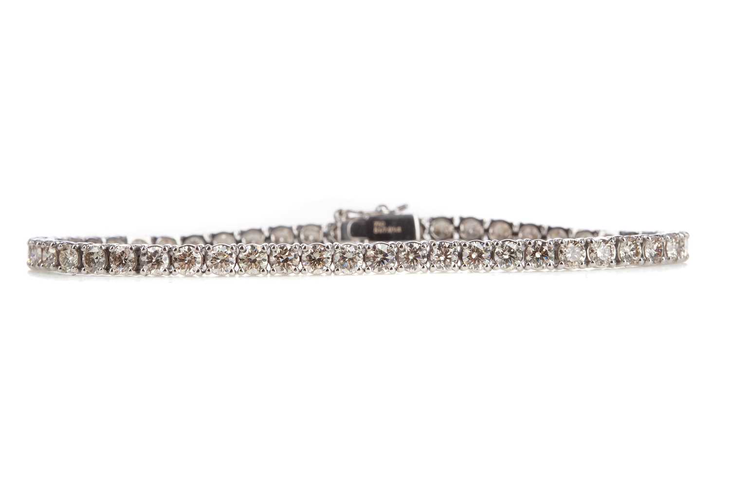 A DIAMOND TENNIS BRACELET