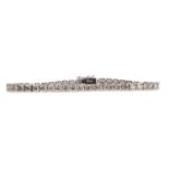 A DIAMOND TENNIS BRACELET