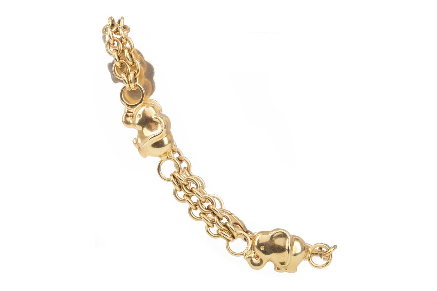 A GOLD ELEPHANT BRACELET