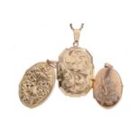 THREE GOLD LOCKETS AND ONE CHAIN