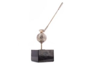 GOLFING INTEREST - A WHITE METAL AND MARBLE DESK WEIGHT