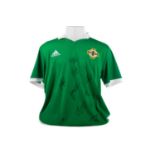 A SIGNED NORTHERN IRELAND INTERNATIONAL FOOTBALL JERSEY