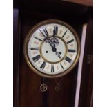 AN EARLY 20TH CENTURY VIENNA-TYPE WALL CLOCK
