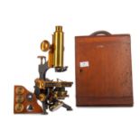 AN EARLY 20TH CENTURY MONOCULAR MICROSCOPE BY W. WATSON & SONS