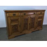 AN ARTS & CRAFTS OAK SIDEBOARD