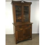 AN ARTS & CRAFTS OAK BOOKCASE CABINET