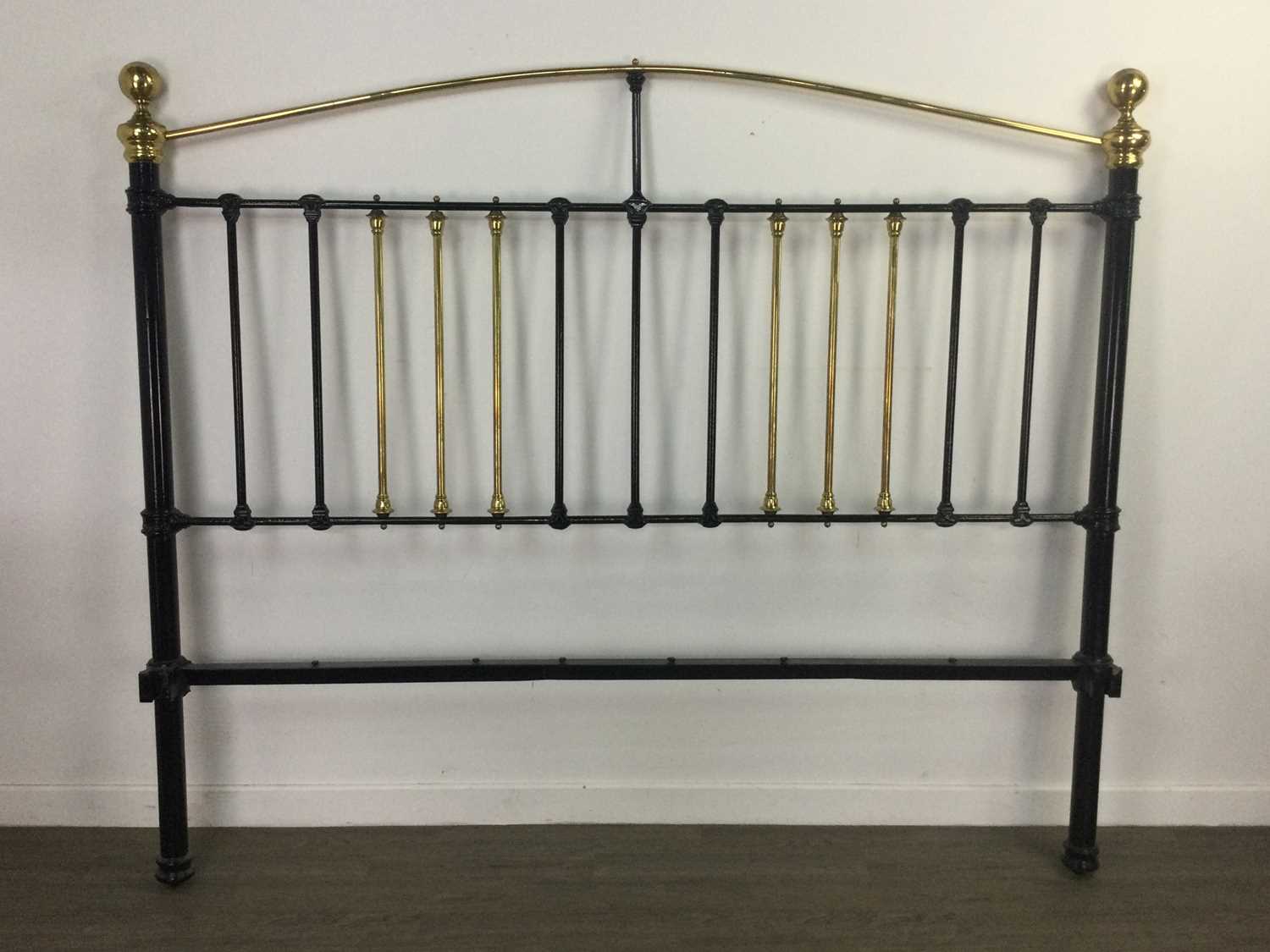 A LARGE VICTORIAN CAST IRON AND BRASS BEDSTEAD