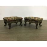 A PAIR OF CAST AND PIERCED BRASS FOOTSTOOLS OF ROCOCO DESIGN