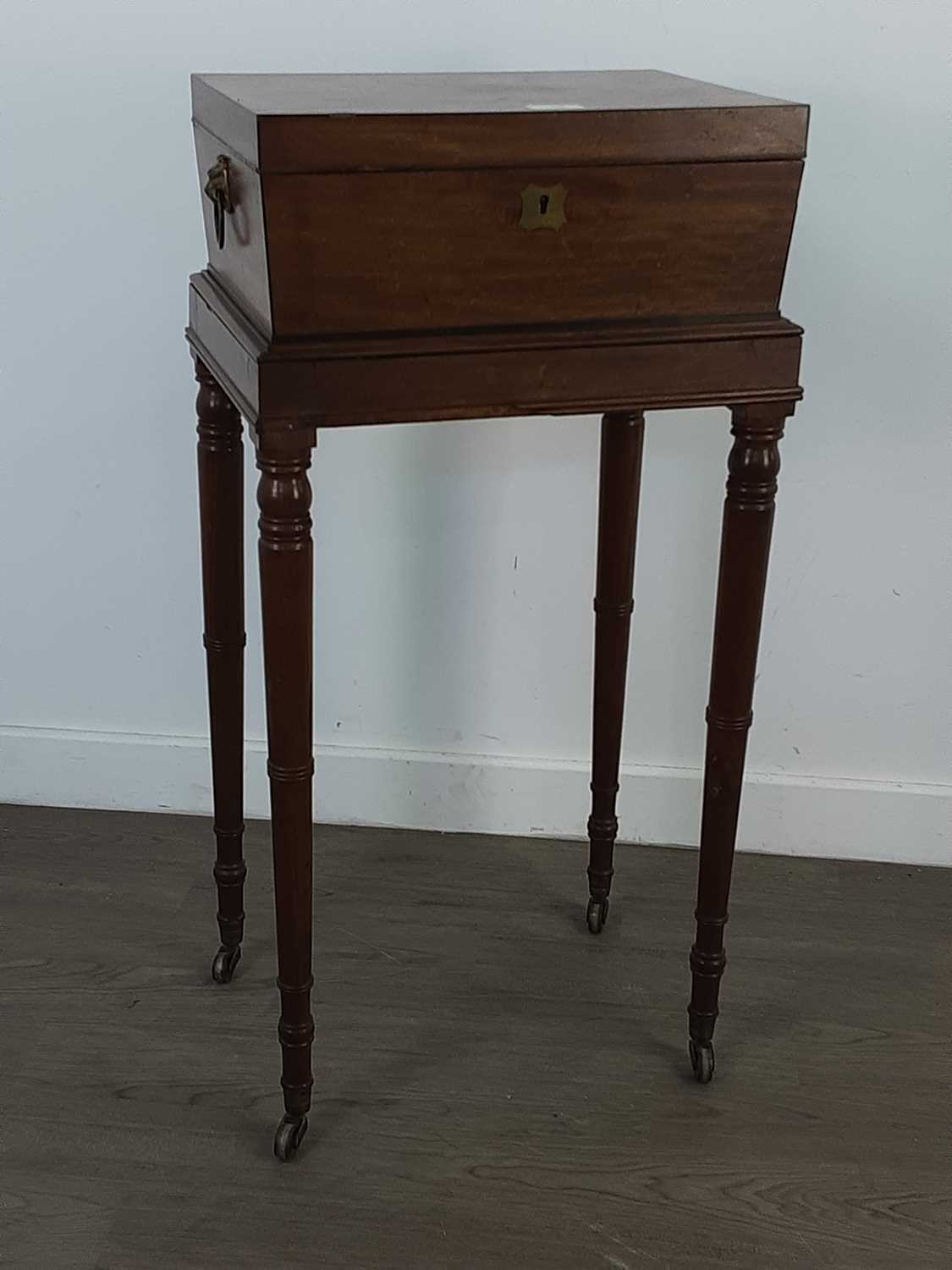 A REGENCY MAHOGANY TEAPOY