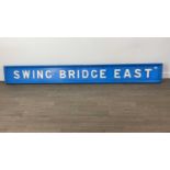 A LARGE SWING BRIDGE EAST WOODEN SIGN