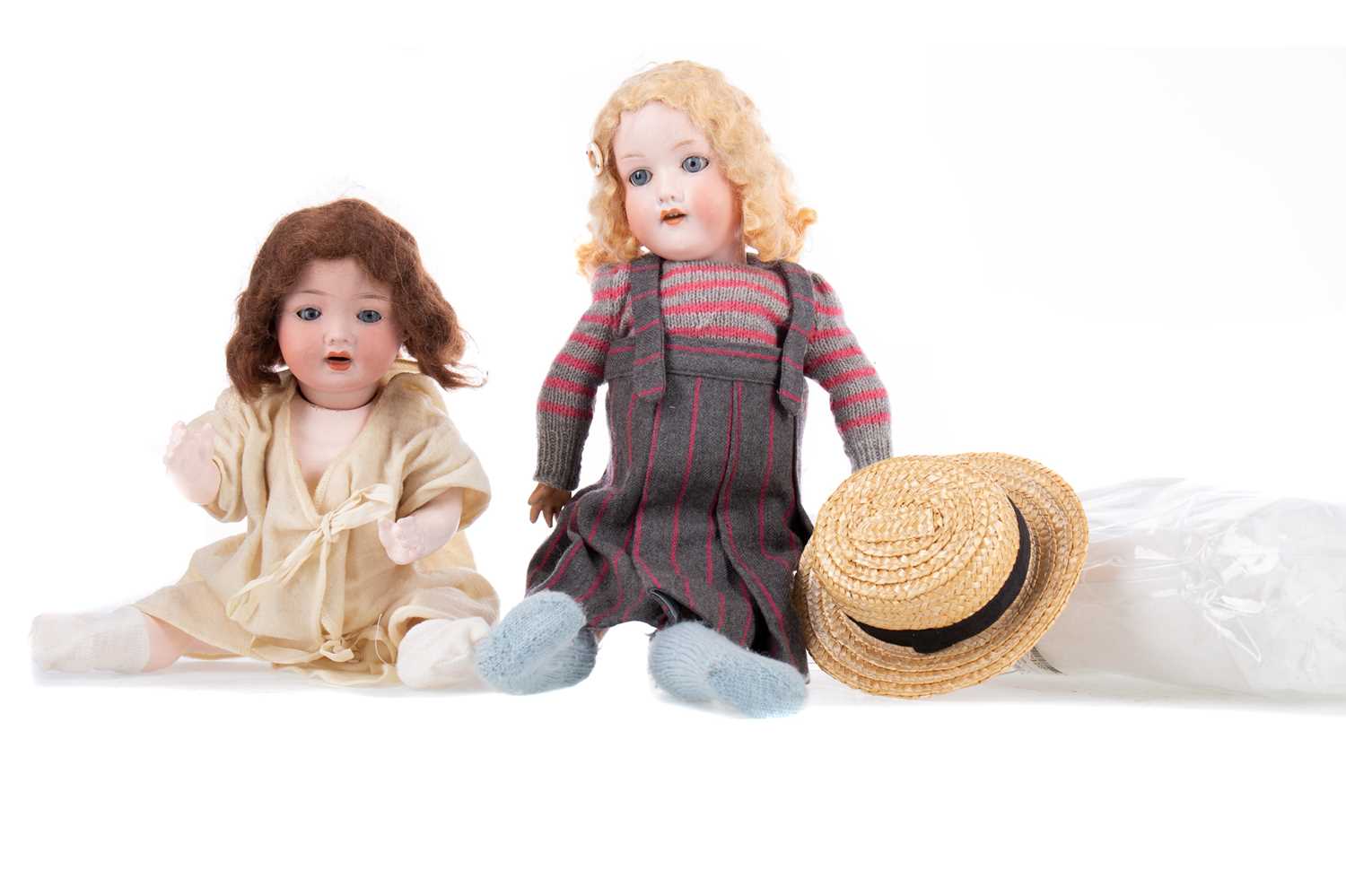 TWO EARLY 20TH CENTURY BISQUE HEADED GIRL DOLLS