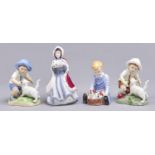 Two Royal Worcester figures of Snowy and September, designed by F G Doughty, 11cm h, printed marks