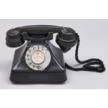 A G.E.C. bakelite table telephone, second quarter 20th c, of pyramid type, model unascertained In