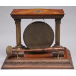 An Edwardian brass mounted oak temple form dinner gong, early 20th c, 27cm h and turned oak