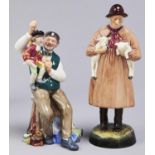 Two Royal Doulton earthenware figures of The Puppetmaker and Lambing Time, 20 and 23cm h, printed