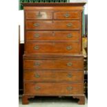 A George III mahogany chest on chest, with crossbanded and cockbeaded drawers, fluted pilasters