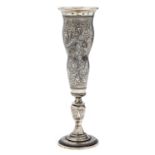 A Russian silver goblet, the waisted slender bowl engraved with flowers and engine turned, on