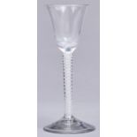 An Engish wine glass, c1770, the rounded funnel bowl on double series opaque twist stem and