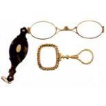 A giltmetal lorgnette, c1900,   with gold inset tortoiseshell scales, 79mm and 19th c giltmetal