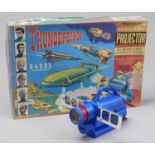 1960s Television.  A Chad Valley glue plastic 'Give a Show' projector and set of Thunderbirds colour