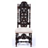 A Victorian carved and ebonised chair, in James II style Joints loose