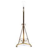 An Edwardian telescopic brass oil lamp standard, converted to electricity, lacks fitment, telescopic