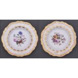 A pair of Copeland and Garrett dessert plates, 1833-47, painted to the centre with a loose bouquet