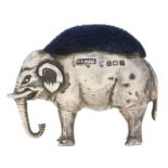 An Edwardian silver elephant novelty pin cushion, 43mm l, by Saunders & Shepherd, Birmingham 1905