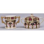 A Royal Crown Derby oval Imari sugar bowl and cover and loving cup, 1973 and 1974, 80 and 75mm h,