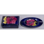 A Moorcroft Hibiscus box and cover and ashtray, c1970, ashtray 16cm l, impressed marks Good