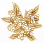 A diamond spray brooch, in 18ct gold, 44mm, by Cropp & Farr, London 1973, 12.2g Good condition