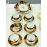 A set of six Spode Japan pattern tea cups and saucers and a saucer dish en suite, c1815, dish 20.5cm