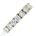 A seven stone diamond ring, in 18ct white gold, Birmingham 1999, 3.8g, size N½ Good condition