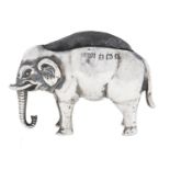 An Edwardian silver elephant novelty pin cushion, 44mm l, maker's mark rubbed,  -BROSS, Birmingham