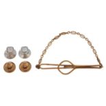 A gold tie clip and two pairs of dress studs, the last set with mother of pearl, all marked 9ct, 7.