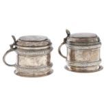Two matching Victorian / Edward VII silver mustard pots, with domed lid and shell thumbpiece, blue
