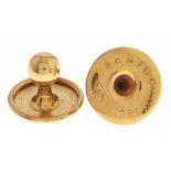 A pair of gold dress studs, marked 18ct, 1.4g Good condition