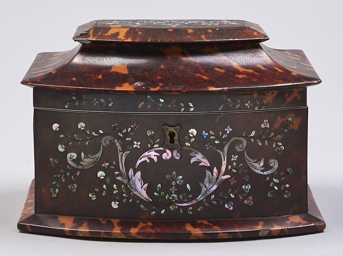 A Victorian tortoiseshell tea chest, of bow fronted form with pagoda lid, inlaid and engraved mother
